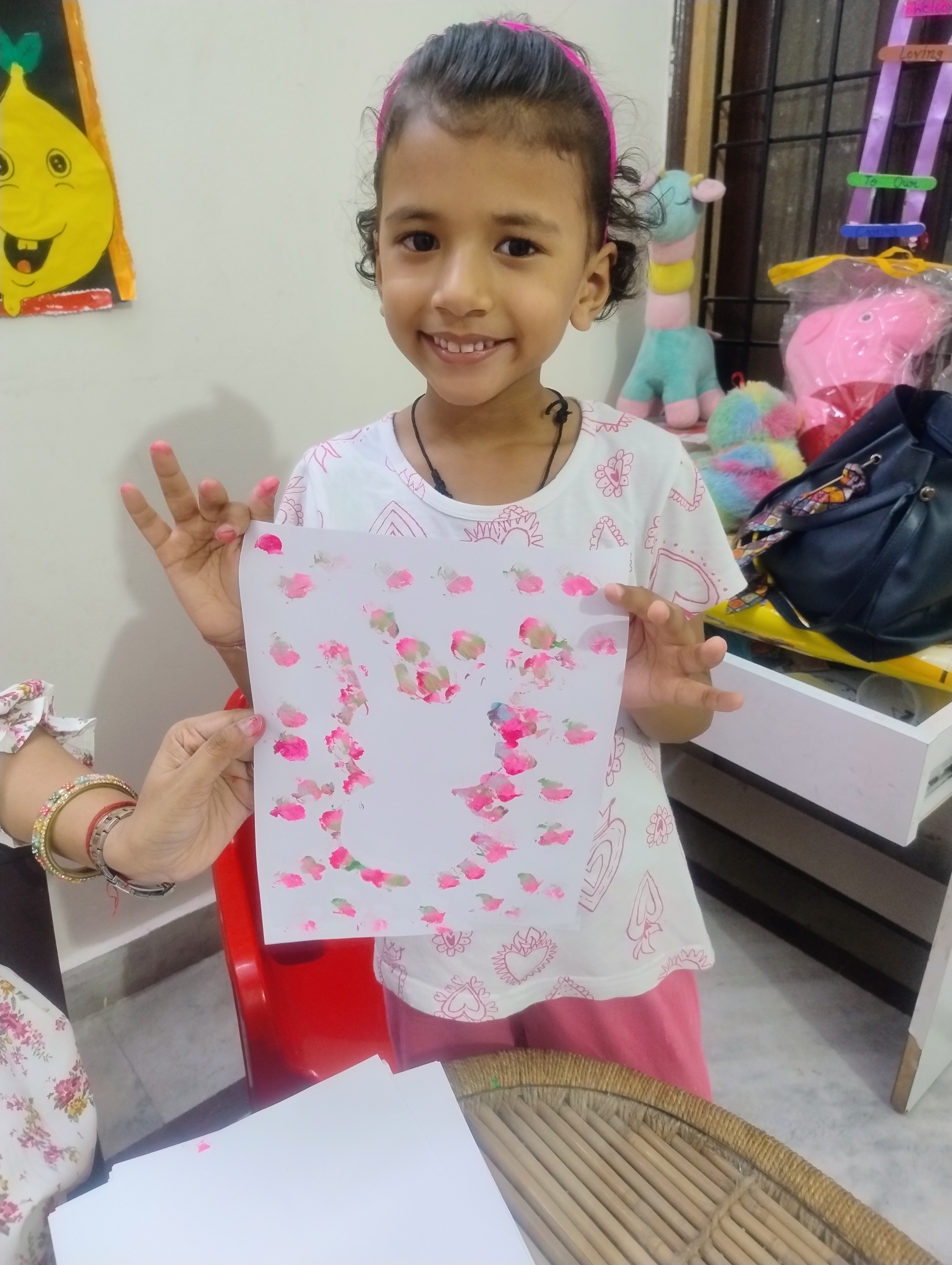 Three children engaged in a learning activity